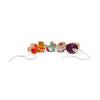 Various farm-themed beads on a white string.