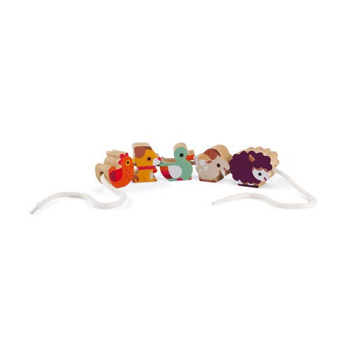 Various farm-themed beads on a white string.