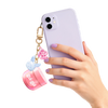 Gui Gui Mini Cloud Slime jar clipped as charm onto back of lavender phone case