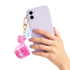 Gui Gui Mini Gloss Slime jar clipped as charm onto back of lavender phone case