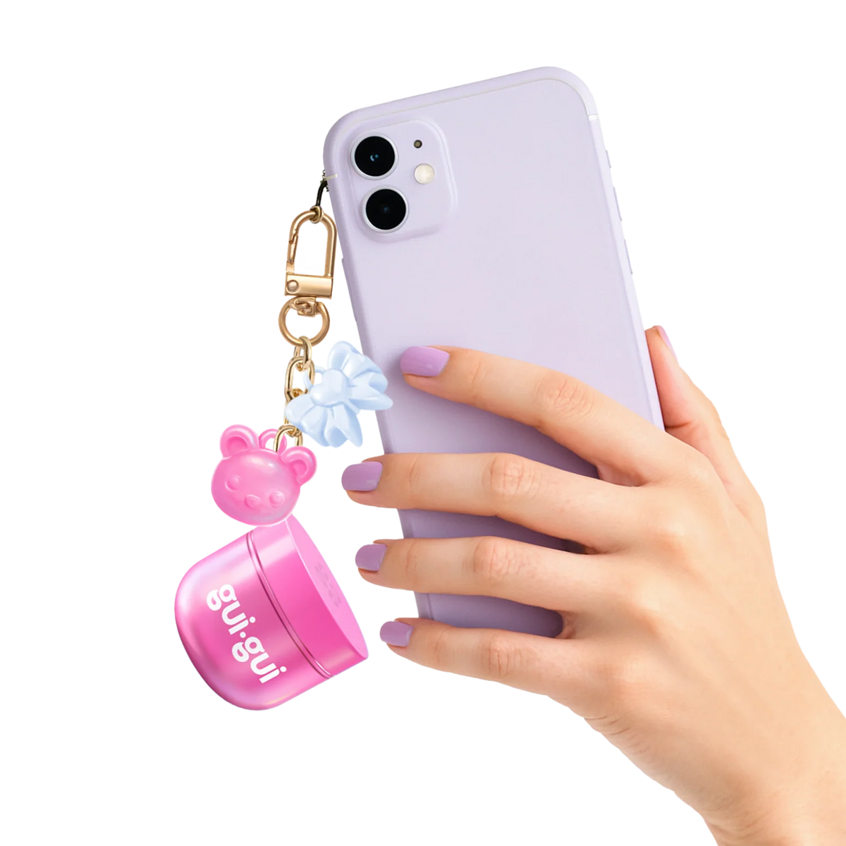 Gui Gui Mini Gloss Slime jar clipped as charm onto back of lavender phone case