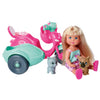 Evi Love blonde doll sitting with gray cat and brown dog figures beside pink and teal scooter with sidecar, out of packaging on white background